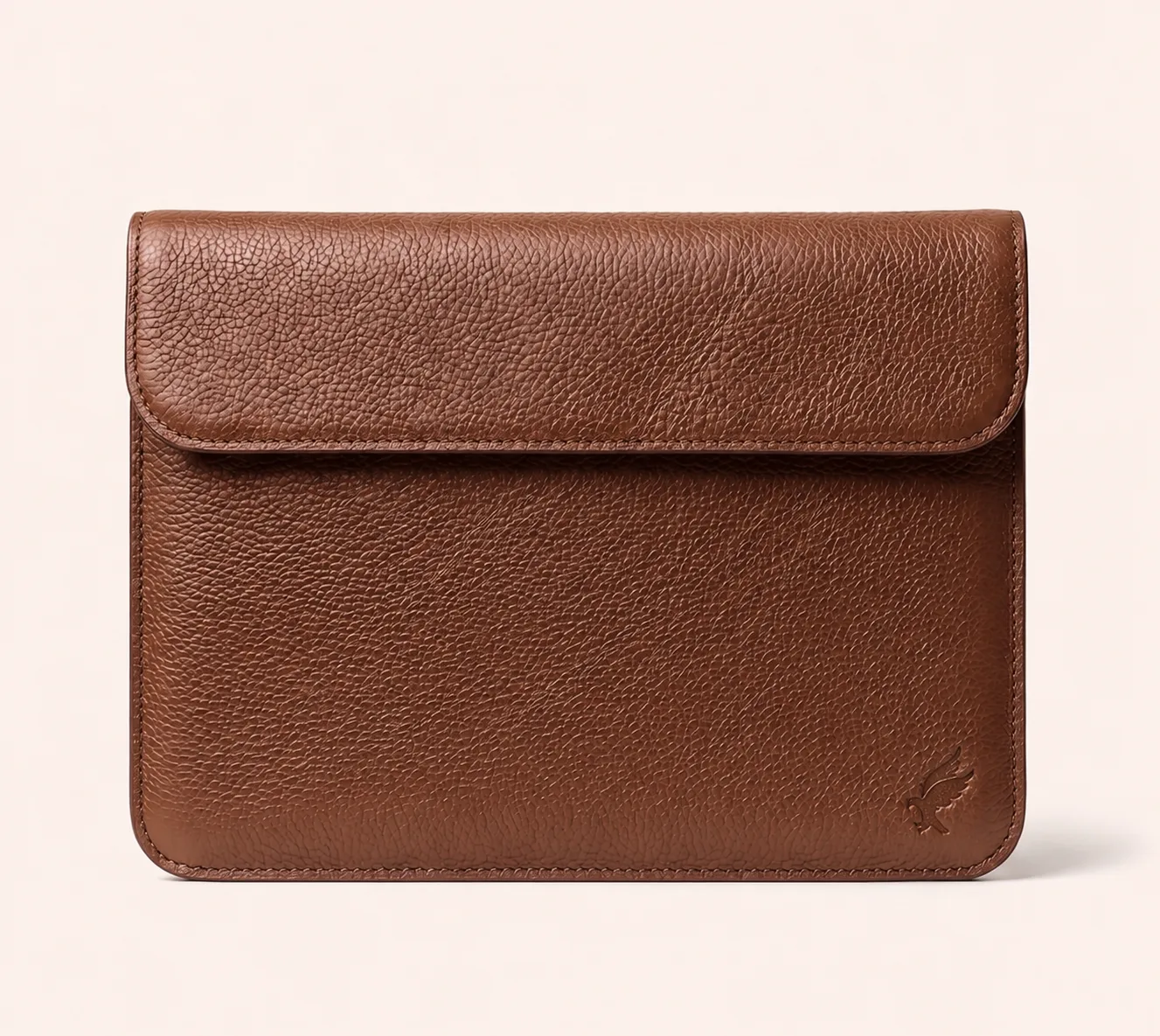 LAVEOR Heritage Sleeve — full-grain leather laptop sleeve in Cognac, handcrafted in Pakistan